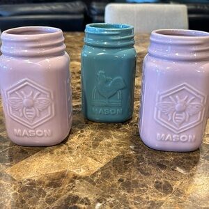 3 decorative mason jars. 2 light purple and 1 blue/green. Excellent condition.